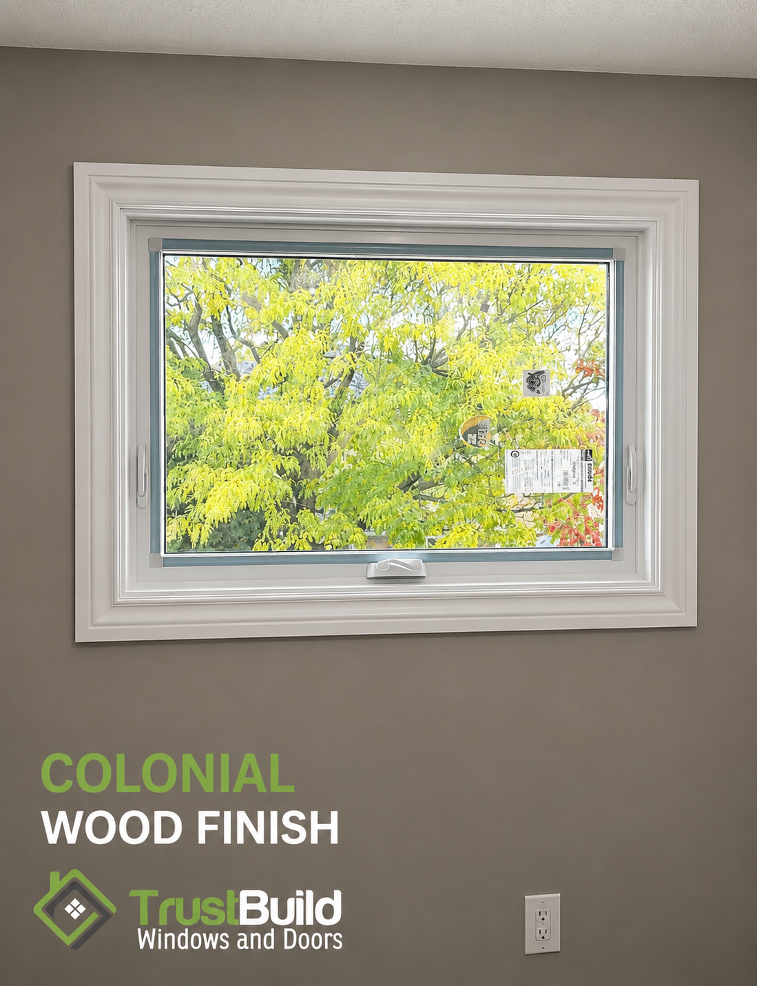 Colonial wood casing profile with layered mouldings framing a white awning window on a warm brown wall, Ontario interior