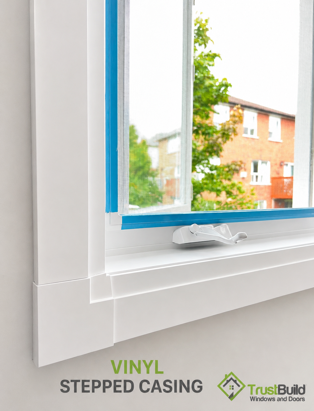 Vinyl stepped window casing with matching stepped rosette blocks at the sill corner, white finish, Ontario installation