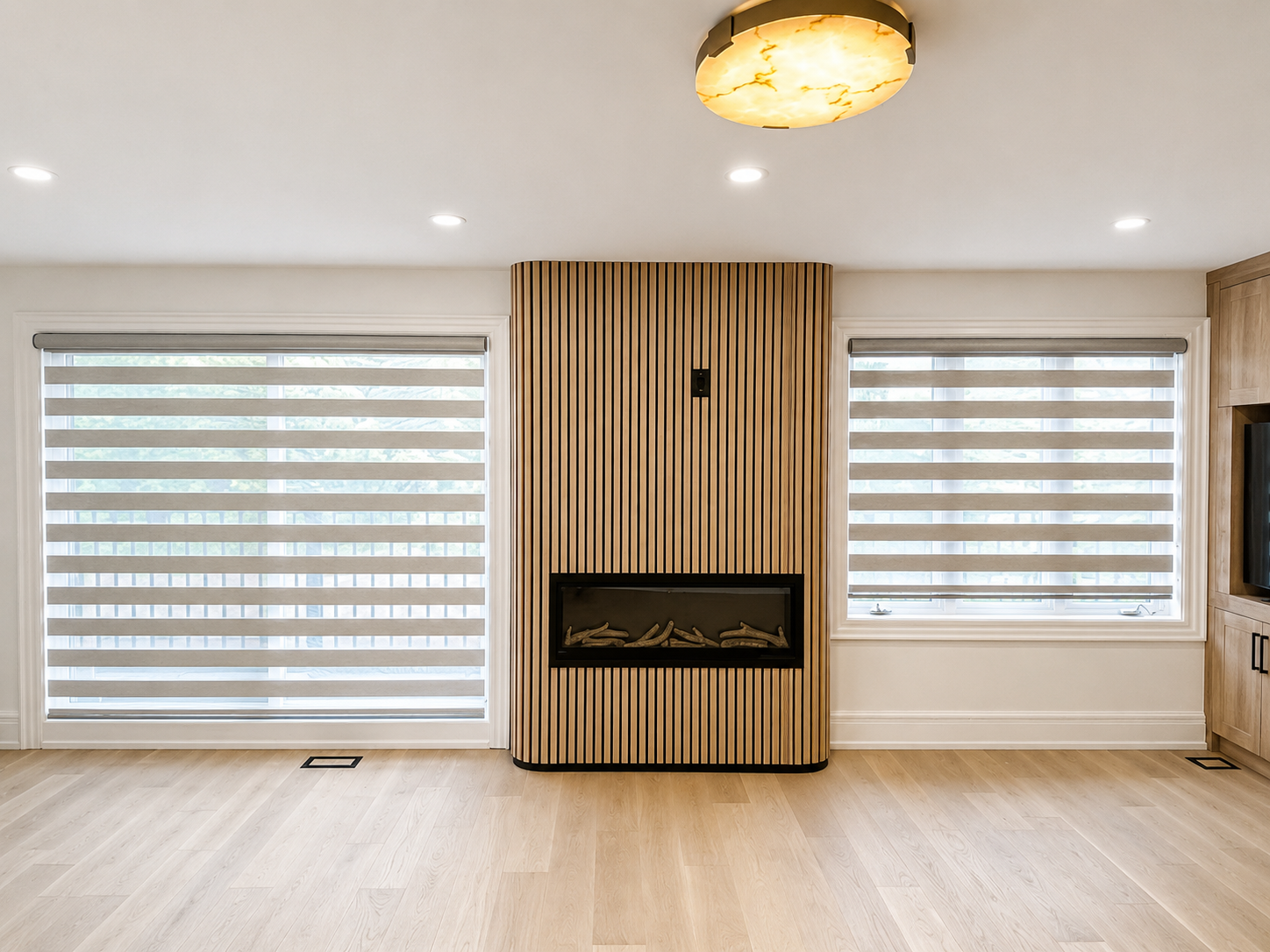 Modern zebra blinds installed in an Ontario living room by Trust Build